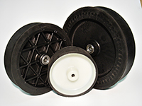 Three black wheels with white bearings